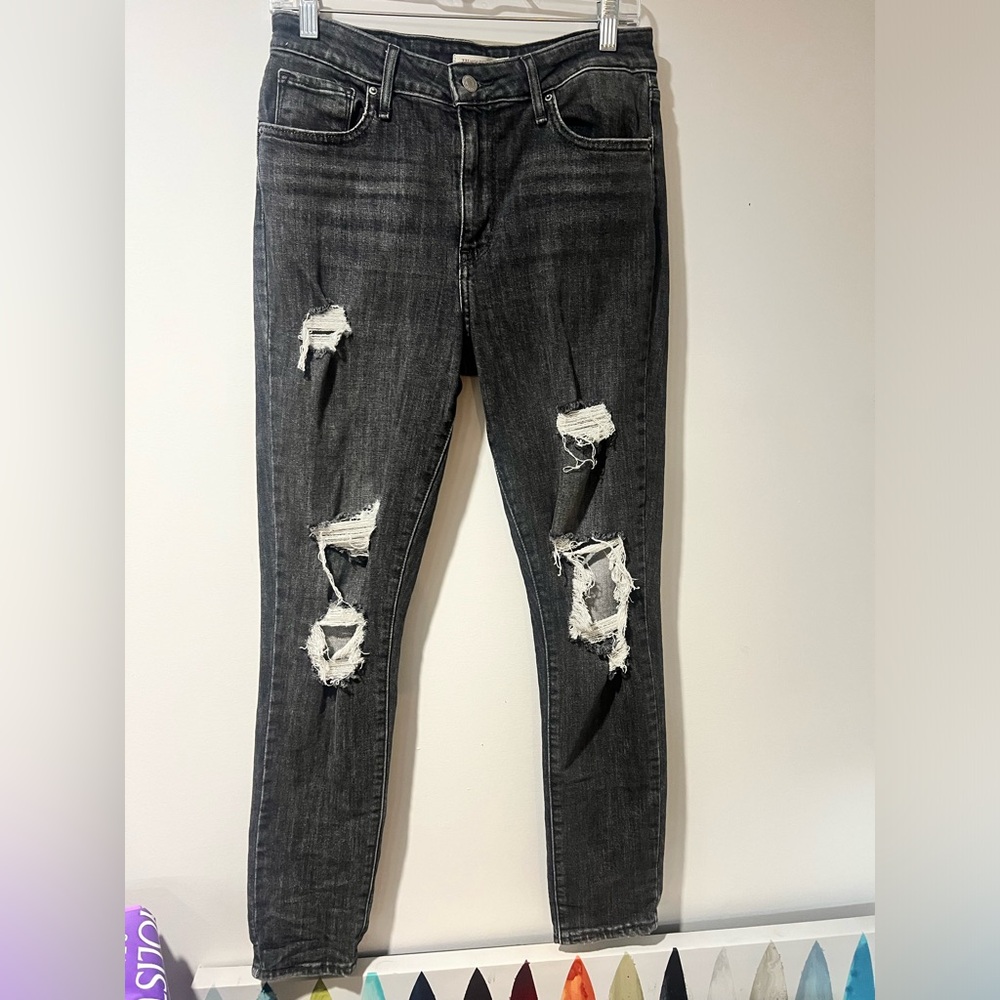 Levis black ripped skinny jeans w/button and zipper